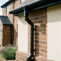 Traditional Adjustable Swanneck 63mm Diameter Aluminium Downpipe — Textured Black (in use)