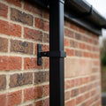 Adjustable Aluminium Pipe Clip 72×72mm – Flush Joint Downpipe — Textured Black (in use)