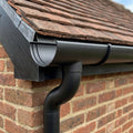 Half Round Aluminium Gutter Outlet 63mm Dia. 125mm — Textured Black (in use)