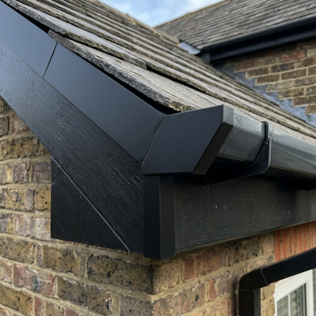 V Return Aluminium Fascia Angle Covers for Mitred Corners — RAL 9005 / 90 Deg External Angle (in use)