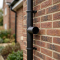 76mm Diameter Flush Joint Downpipe Branches — Textured Black / 92.5 Degrees (in use)