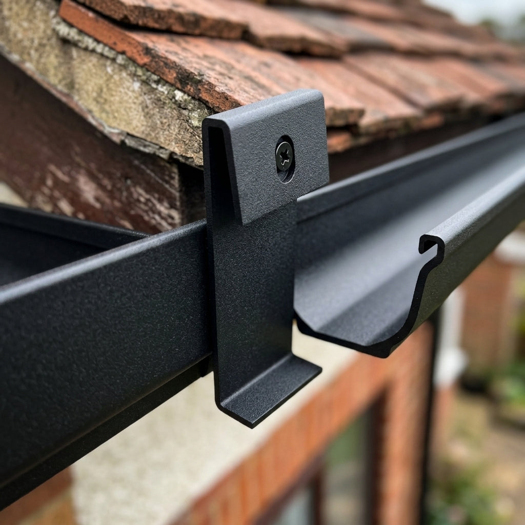Moulded Ogee Gutter Direct Fix Bracket 125 x 100mm — Textured Black (in use)