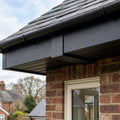Aluminium Soffit Board Joint Cover — Textured Black (in use)